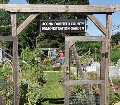 demonstration garden sign and gate into the garden.