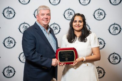 Indu Upadhyaya receiving the  Poultry Science Association Early Achievement Award for Extension