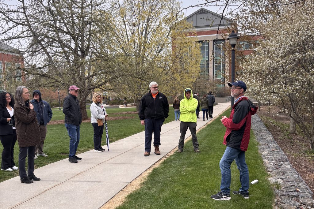 group touring sustainable landscape features